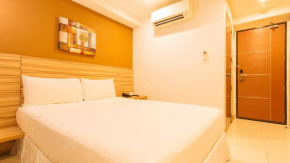 Гостиница Guijo Suites Makati - Quarantine Hotel  Манила